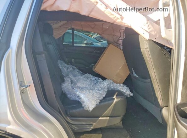 1GNSKBKC4JR306418 2018 CHEVROLET TAHOE Silver Rear interior view