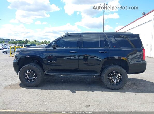 1GNSKBKC7HR276339 2017 CHEVROLET TAHOE Черный Вид задней части салона