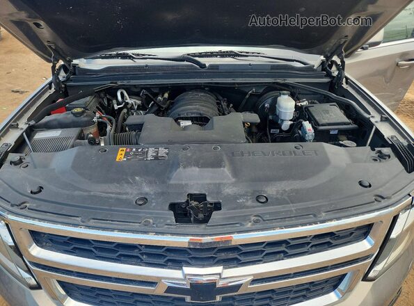 1GNSKBKC7KR291804 2019 CHEVROLET TAHOE Gray Rear interior view