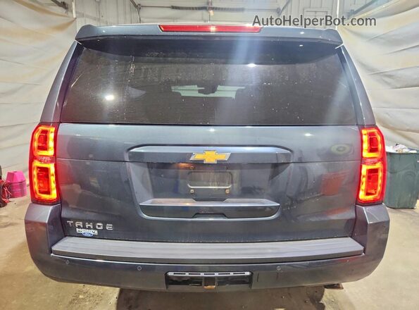 1GNSKBKC8KR222474 2019 CHEVROLET TAHOE Серый Вид сзади