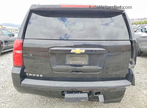 1GNSKBKCXKR364910 2019 CHEVROLET TAHOE Black Rear view