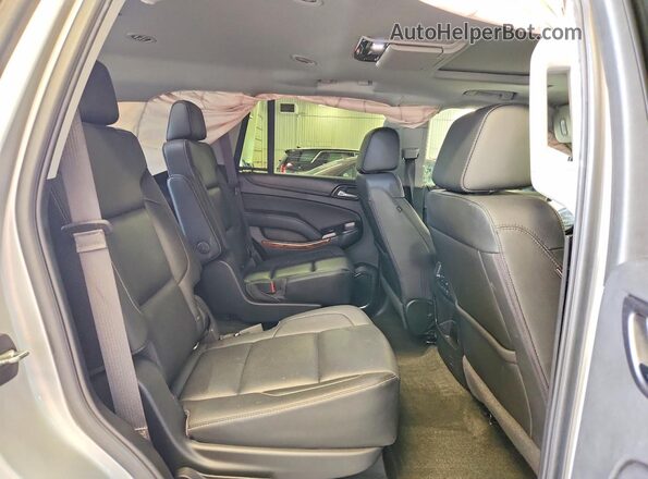 1GNSKCKC1JR242585 2018 CHEVROLET TAHOE Silver უკანა სალონის ხედი
