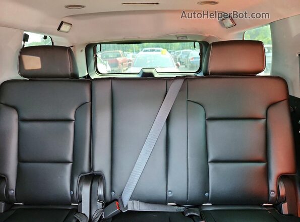 1GNSKDEC7JR259604 2018 CHEVROLET TAHOE Black Widok tylnych siedzeń