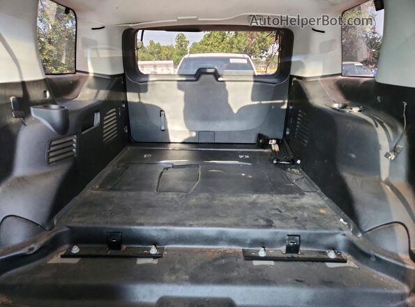 1GNSKDKC0JR240140 2018 CHEVROLET TAHOE Black Հետևի նստատեղերի տեսք