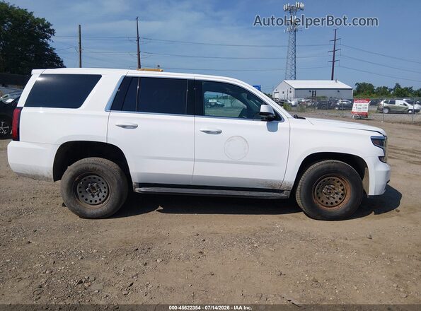 1GNSKFEC4LR236747 2020 CHEVROLET TAHOE White Widok wnętrza z tyłu