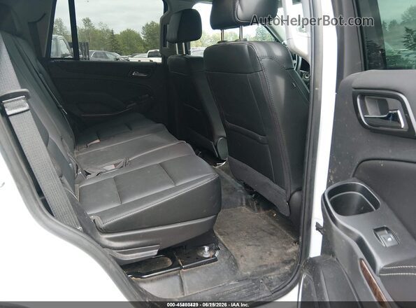 1GNSKFEC7LR140935 2020 CHEVROLET TAHOE White VIN կոդի պիտակի տեսք