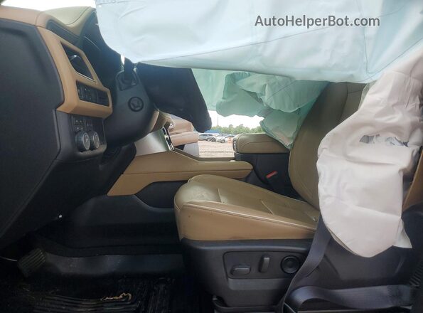 1GNSKFKD9PR176600 2023 CHEVROLET SUBURBAN Red Front interior view