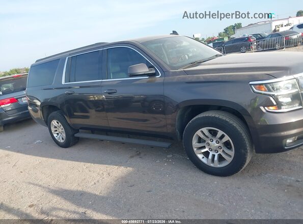 1GNSKHKC2GR162296 2016 CHEVROLET SUBURBAN Gray Սալոնի հետևի տեսք