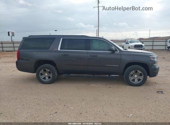1GNSKHKC2JR299794 2018 CHEVROLET SUBURBAN Gray Rear interior view