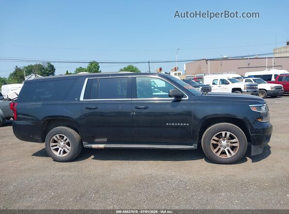 1GNSKHKC7GR165940 2016 CHEVROLET SUBURBAN Black Вид задньої частини салону