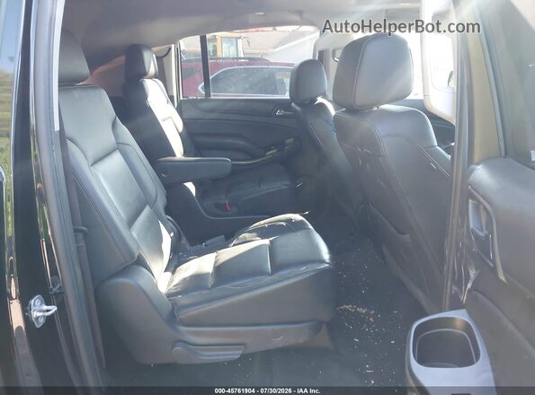 1GNSKHKC7GR292008 2016 CHEVROLET SUBURBAN Black Vista de la etiqueta del VIN