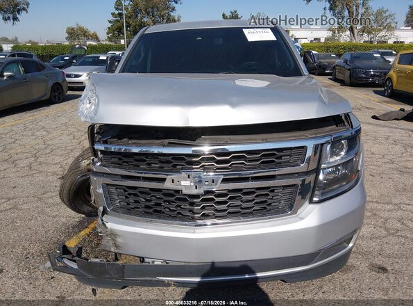1GNSKHKC8HR204522 2017 CHEVROLET SUBURBAN Silver Rear interior view