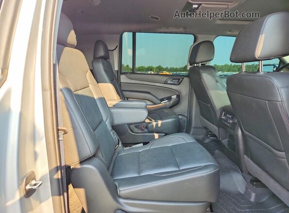 1GNSKJKC4KR294590 2019 CHEVROLET SUBURBAN Silver Widok wnętrza z tyłu
