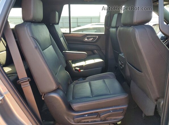 1GNSKNKD9PR141291 2023 CHEVROLET TAHOE Silver უკანა სალონის ხედი