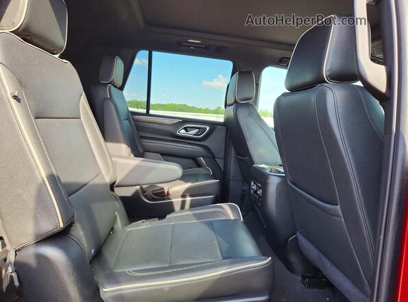1GNSKSKD1PR309200 2023 CHEVROLET TAHOE Red Rear seats view