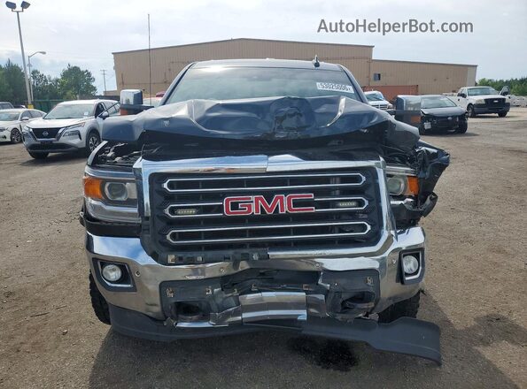 1GT12TEG6JF200871 2018 GMC SIERRA Black Front view