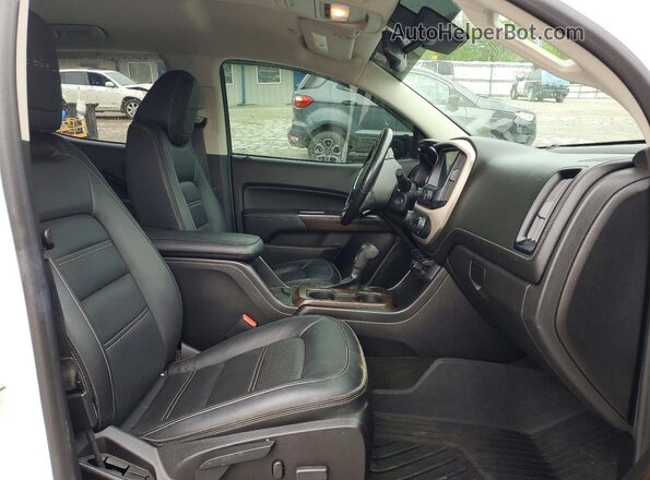 1GTG6EEN3H1263183 2017 GMC CANYON White Widok wnętrza z przodu