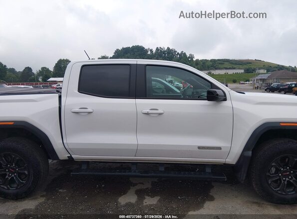 1GTP2BEK7S1198152 2025 GMC CANYON White Widok wnętrza z tyłu