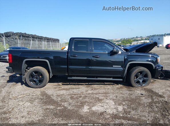 1GTV2LEC0JZ127929 2018 GMC SIERRA Black Widok wnętrza z tyłu