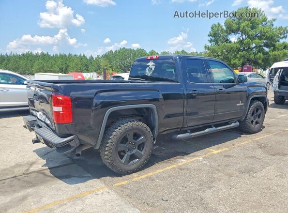 1GTV2LEC2JZ106595 2018 GMC SIERRA Black Trasero derecho