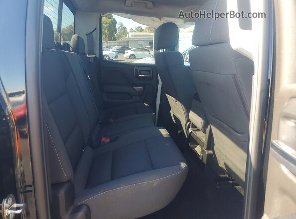 1GTV2MEC0JZ306154 2018 GMC SIERRA Black Vista de los asientos traseros