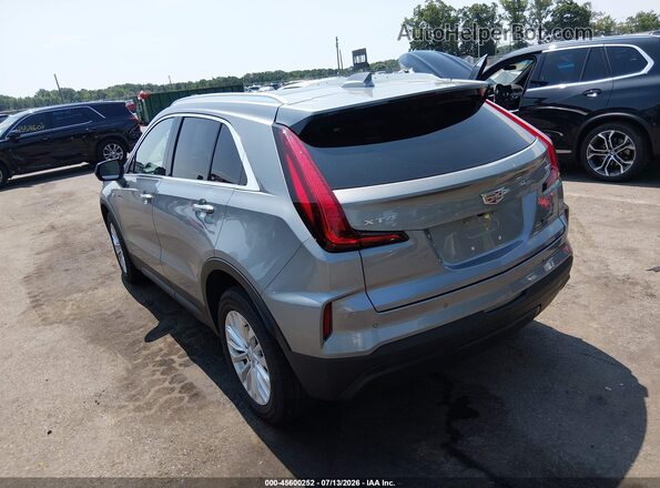 1GYAZAR40RF219051 2024 CADILLAC XT4 Silver Trasero izquierdo