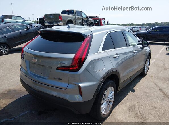1GYAZAR40RF219051 2024 CADILLAC XT4 Silver Trasero derecho