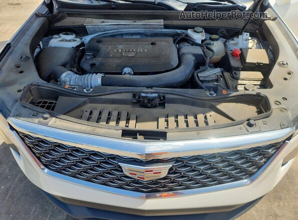 1GYAZAR41RF129701 2024 CADILLAC XT4 White Vista del compartimento del motor