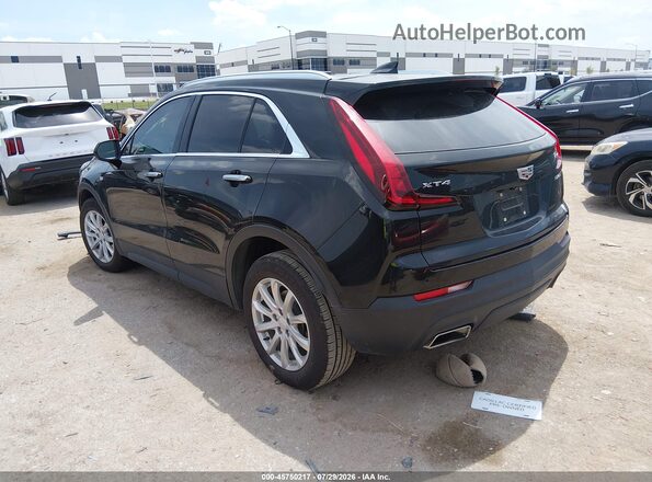 1GYAZAR43PF149199 2023 CADILLAC XT4 Black Trasero izquierdo
