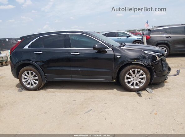 1GYAZAR43PF149199 2023 CADILLAC XT4 Black Vista interior trasera