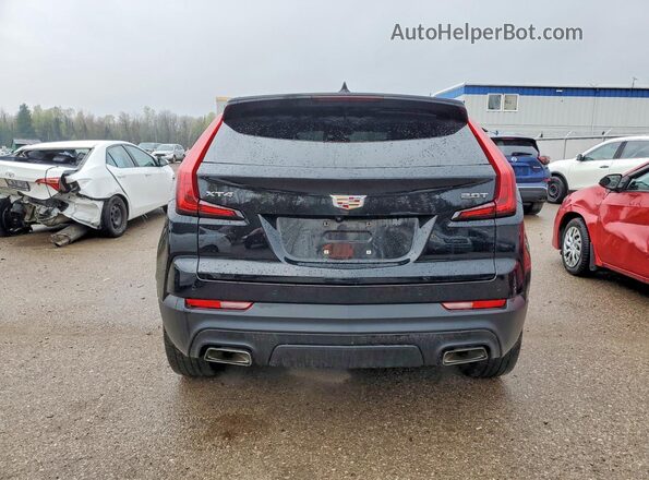 1GYAZAR46KF178544 2019 CADILLAC XT4 Black უკანა ხედი