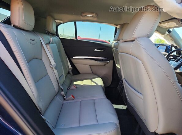 1GYAZAR49NF137944 2022 CADILLAC XT4 Синий Вид задней части салона