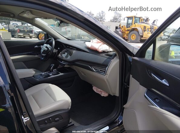 1GYAZAR4XKF155669 2019 CADILLAC XT4 Black წინა სალონის ხედი