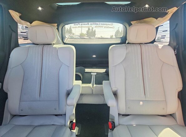 1GYC3NML4TZ711121 2026 CADILLAC VISTIQ Red Вид задніх сидінь