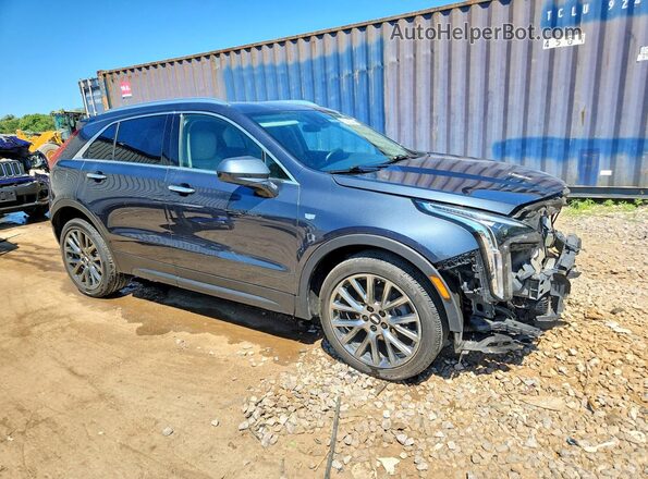 1GYFZBR41MF026220 2021 CADILLAC XT4 Синий Передняя правая четверть