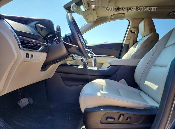 1GYFZBR41MF026220 2021 CADILLAC XT4 Синий Вид салона спереди