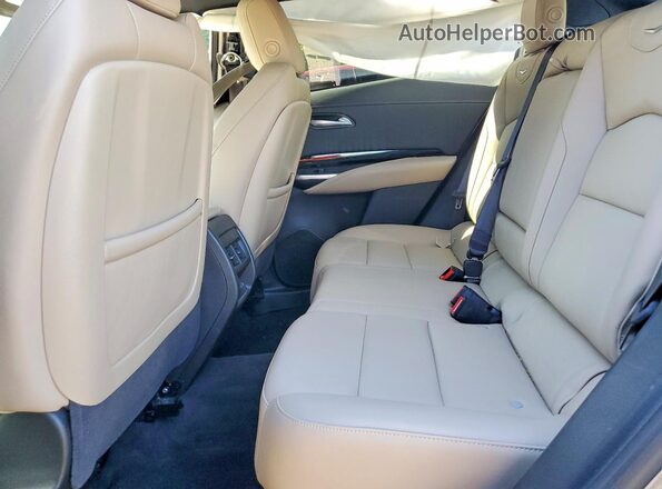 1GYFZBR45RF242580 2024 CADILLAC XT4 Black Vista de los asientos traseros
