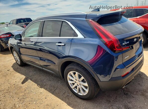 1GYFZBR4XKF181622 2019 CADILLAC XT4 Blue Rear left