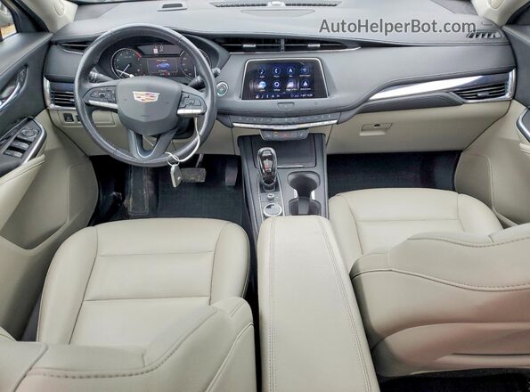 1GYFZBR4XLF025694 2020 CADILLAC XT4 Blue Dashboard view