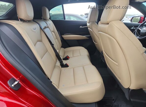 1GYFZCR42RF124055 2024 CADILLAC XT4 Red Rear seats view