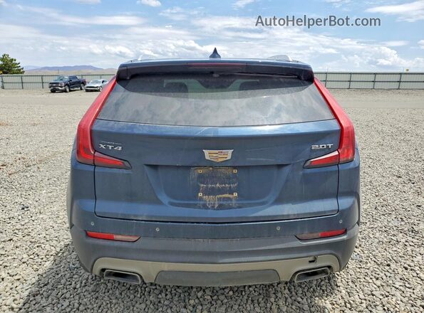1GYFZCR47KF106897 2019 CADILLAC XT4 Blue უკანა ხედი