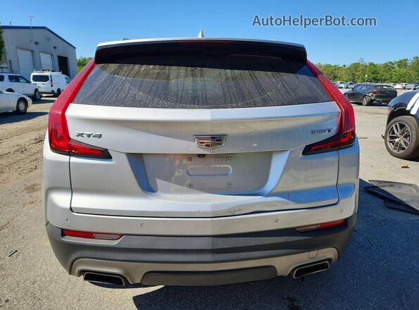 1GYFZCR47NF124157 2022 CADILLAC XT4 Серебряный Вид сзади