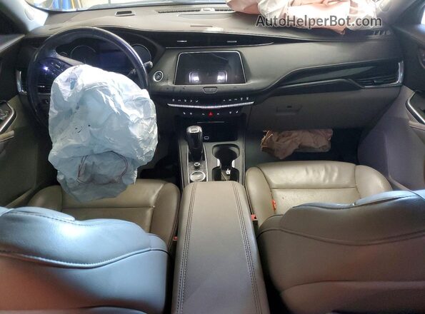 1GYFZCR48KF100865 2019 CADILLAC XT4 Серебряный Вид панели приборов