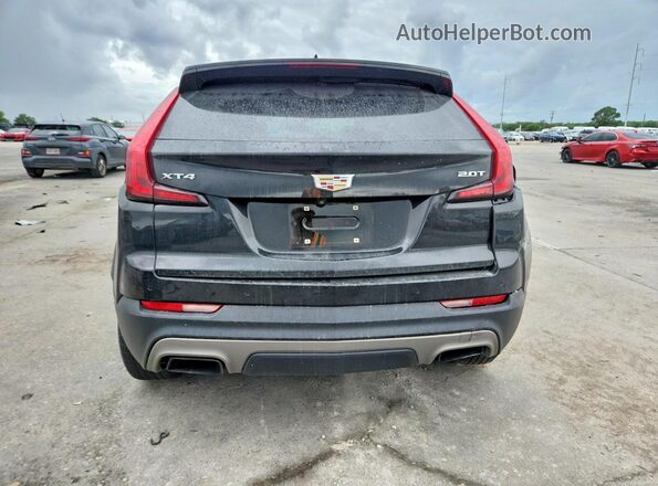 1GYFZCR49KF179432 2019 CADILLAC XT4 Черный Вид сзади