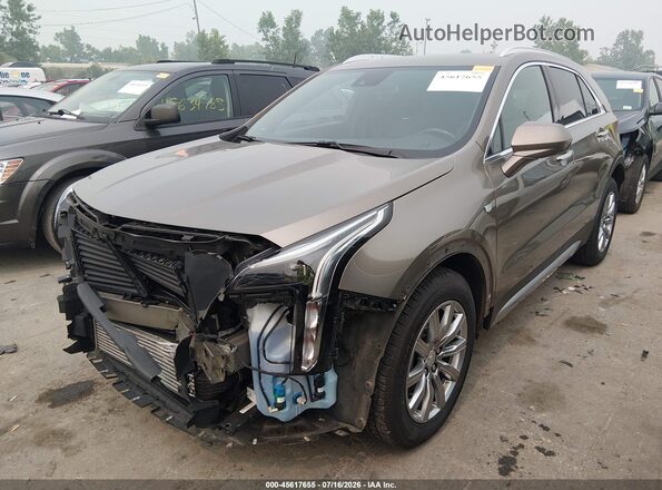 1GYFZDR40LF095362 2020 CADILLAC XT4 Золотой Передняя левая четверть