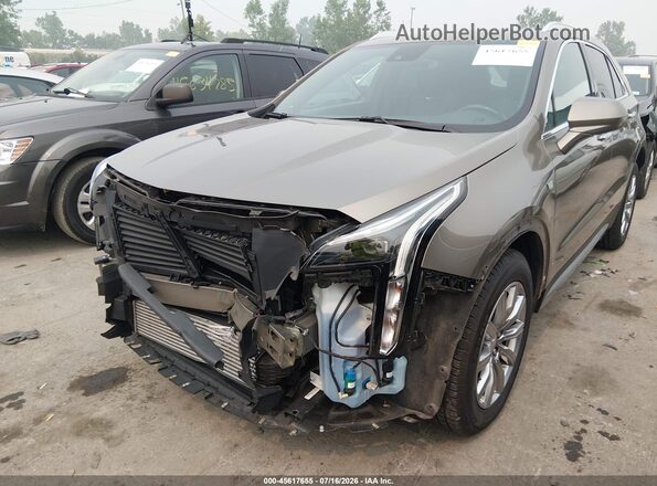 1GYFZDR40LF095362 2020 CADILLAC XT4 Золотой Вид спереди