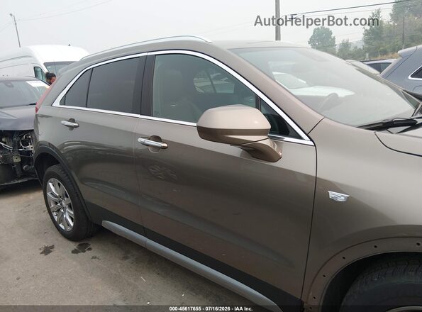 1GYFZDR40LF095362 2020 CADILLAC XT4 Золотой Вид задней части салона