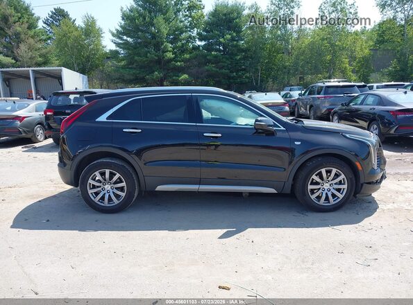 1GYFZDR40MF071001 2021 CADILLAC XT4 Black Սալոնի հետևի տեսք