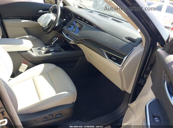 1GYFZDR40NF127200 2022 CADILLAC XT4 Black Vista interior delantera
