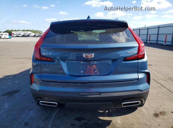 1GYFZDR40RF159716 2024 CADILLAC XT4 Синий Вид сзади
